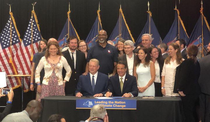 Former Vice President Al Gore joined Cuomo for the signing in New York City.