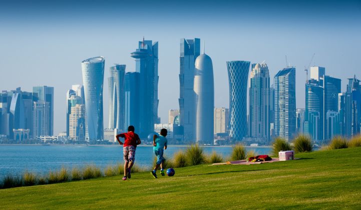 Boys playing soccer in Doha. Qatar has promised to make its 2022 World Cup carbon-neutral.