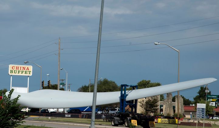 A wind rotor blade being transported to a project site in Kansas.