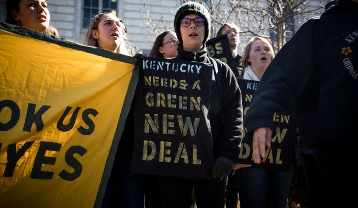 Activists protesting Kentucky Senator Mitch McConnell's opposition to the proposed Green New Deal.