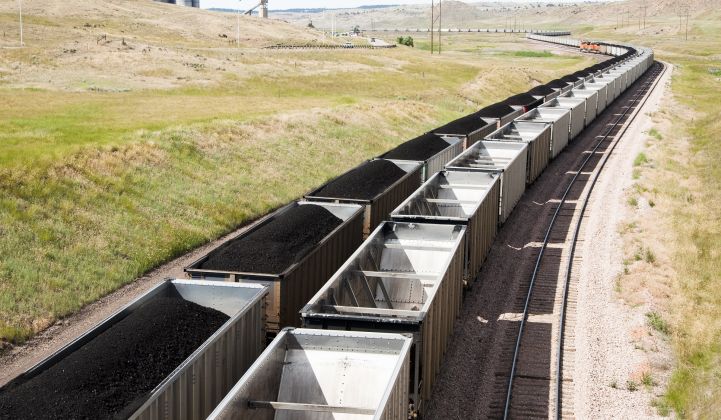 Rail cars loaded with coal mined in Wyoming. Many U.S. coal mining companies have gone bankrupt.