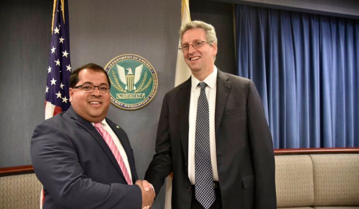 New FERC chair Richard Glick, pictured with fellow FERC Commissioner Neil Chatterjee, will bring Democratic leadership to a federal agency core to President Biden's clean energy agenda. (Credit: FERC)