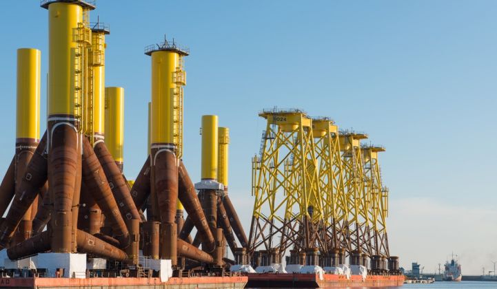 Offshore wind foundations lined up at a German port. New Jersey hopes to see the same.