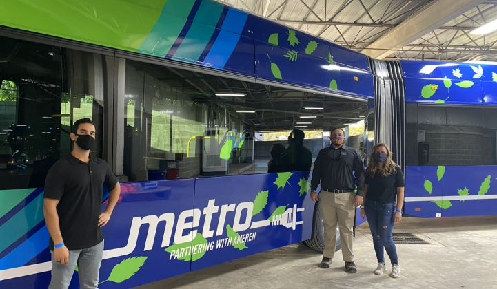 Zoheb Davar and Blanca Tarrgo from The Mobility House join Jonah Crespo of New Flyer in inspecting a new electric bus in St. Louis. (Credit: Mobility House)