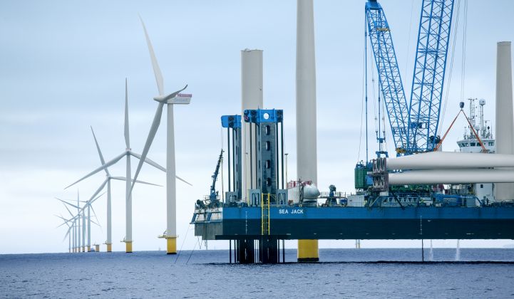 An offshore wind farm under construction in Europe. (Credit: Orsted)